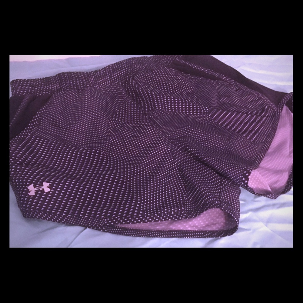 Under armor black and purple exercise shorts